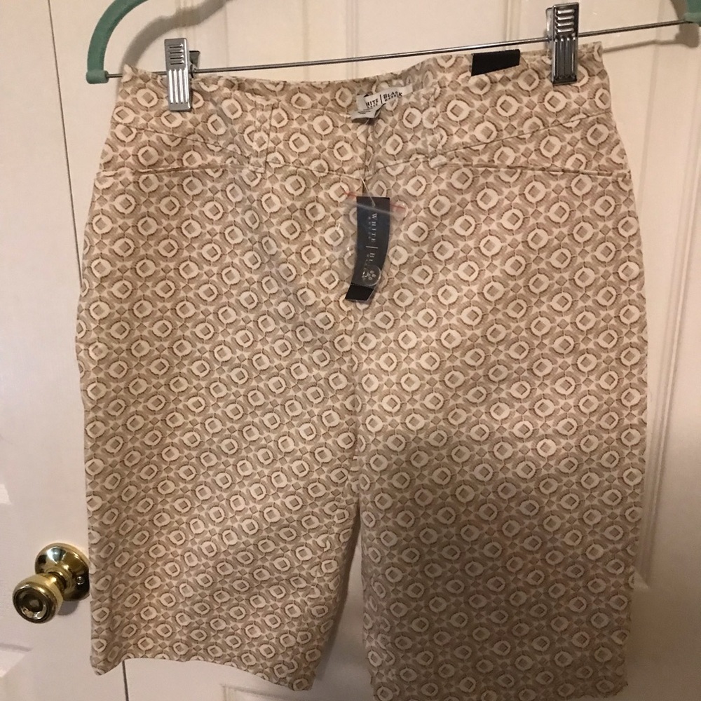 Brown and white/beige shorts.